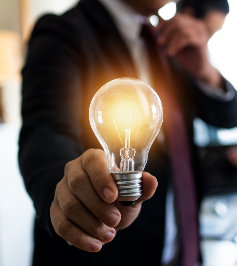 attorney holding lightbulb